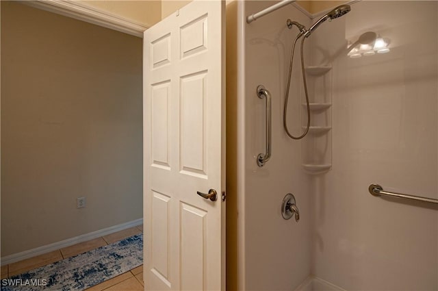 bathroom featuring tile patterned flooring and walk in shower