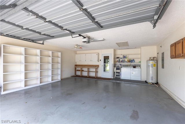 garage with electric water heater, electric panel, a garage door opener, ceiling fan, and independent washer and dryer