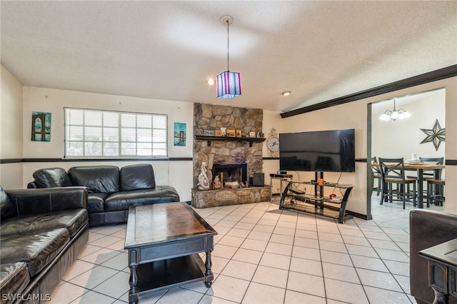 living room with light tile patterned floors, a stone fireplace, a textured ceiling, and vaulted ceiling