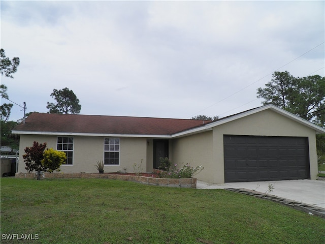 ranch-style home with a front yard and a garage