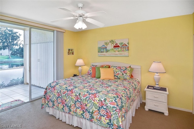 14931 Park Lake Dr Unit 109, Fort Myers, FL 33919 - carpeted bedroom featuring access to exterior and ceiling fan