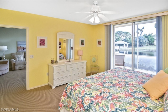 14931 Park Lake Dr Unit 109, Fort Myers, FL 33919 - bedroom featuring light colored carpet, access to outside, a ceiling fan, and a water view