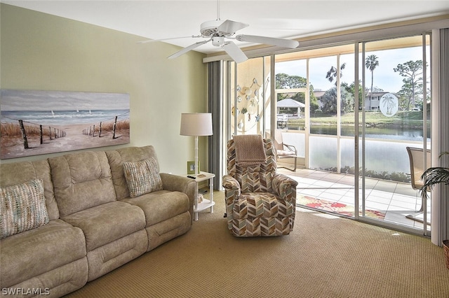 14931 Park Lake Dr Unit 109, Fort Myers, FL 33919 - living area with carpet floors, a water view, and ceiling fan