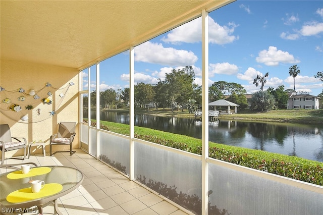 14931 Park Lake Dr Unit 109, Fort Myers, FL 33919 - unfurnished sunroom with a water view