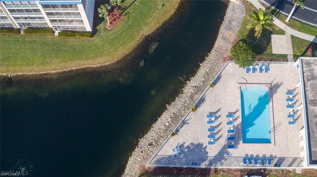 14931 Park Lake Dr Unit 109, Fort Myers, FL 33919 - drone / aerial view of a large body of water and a pool area