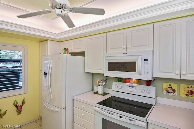 14931 Park Lake Dr Unit 109, Fort Myers, FL 33919 - kitchen with white appliances, white cabinets, light countertops, and ceiling fan