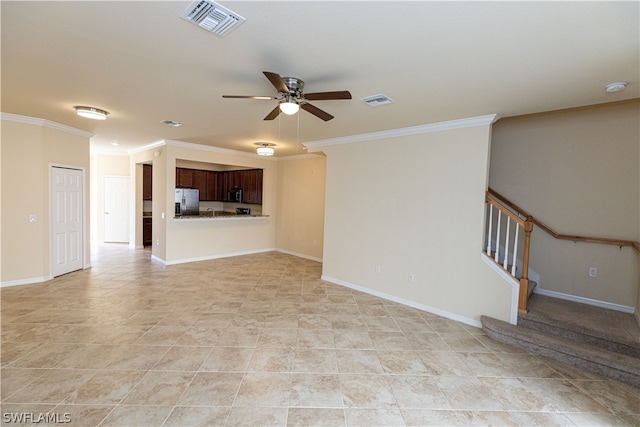 unfurnished living room featuring ceiling fan and ornamental molding