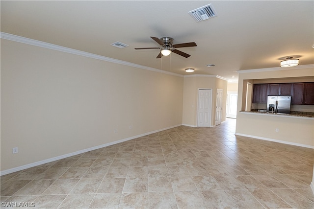 unfurnished living room featuring ceiling fan, light tile patterned flooring, and ornamental molding