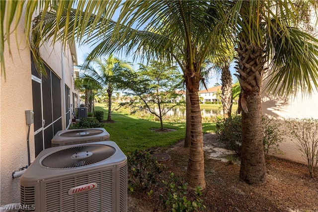 view of yard with central AC unit