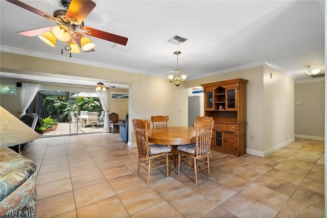 dining room with ceiling fan with notable chandelier and crown molding