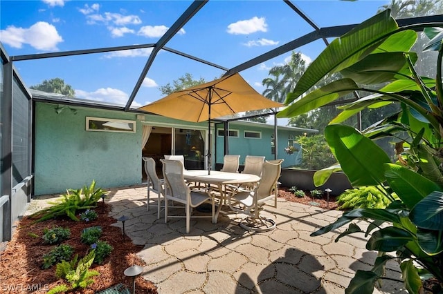 view of patio with a lanai