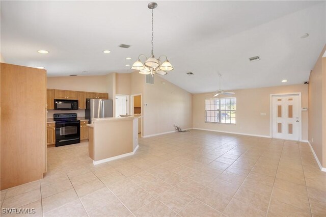 kitchen with black appliances, lofted ceiling, ceiling fan with notable chandelier, and light tile patterned flooring