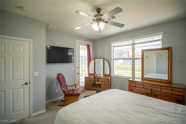 carpeted bedroom with access to exterior and ceiling fan