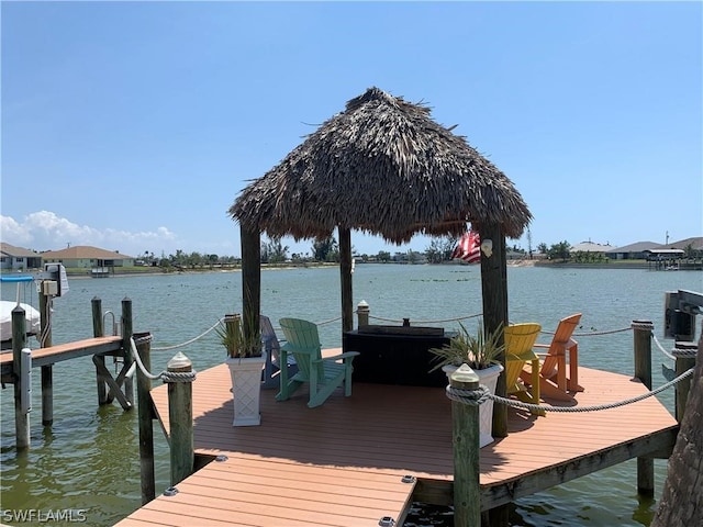 view of dock with a water view