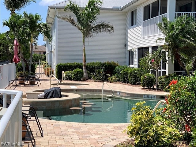 view of pool with a patio area