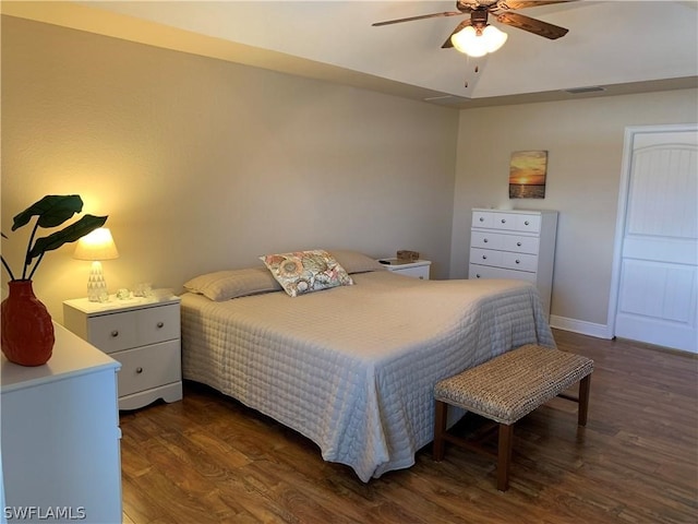 bedroom with hardwood / wood-style flooring and ceiling fan