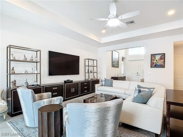 living room with ceiling fan