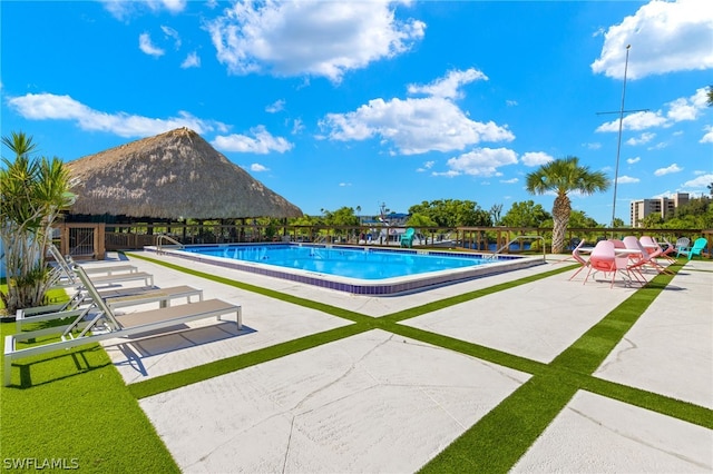 view of pool featuring a patio area