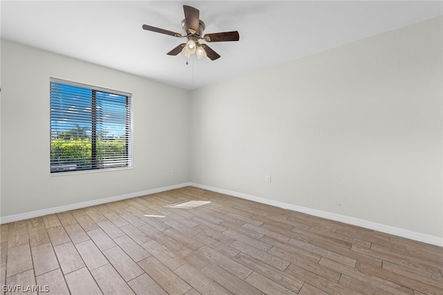 unfurnished room featuring ceiling fan and light hardwood / wood-style flooring