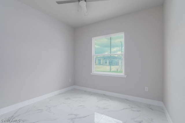 spare room featuring ceiling fan