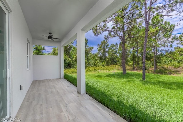 view of patio / terrace featuring ceiling fan