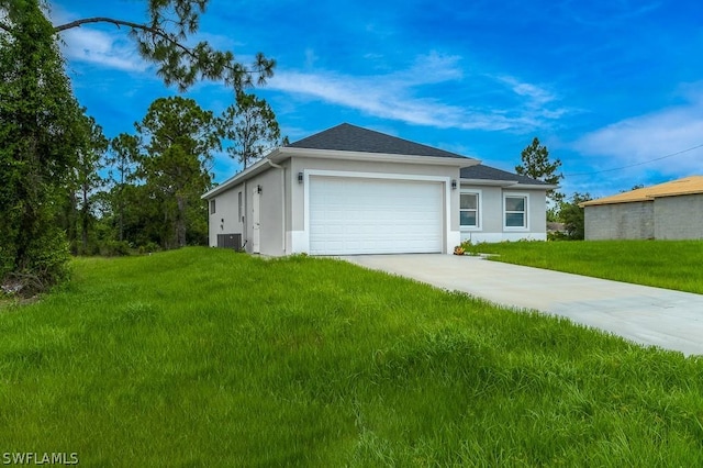 single story home with cooling unit, a front yard, and a garage