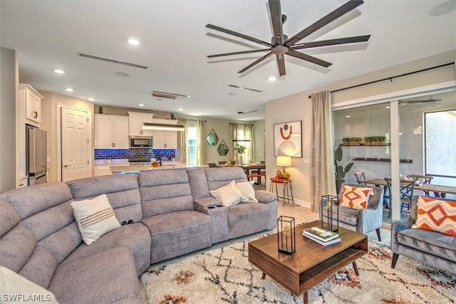 living room with ceiling fan