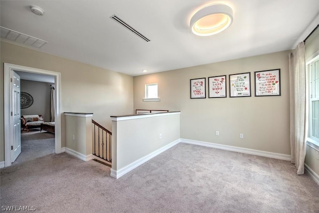 view of carpeted spare room