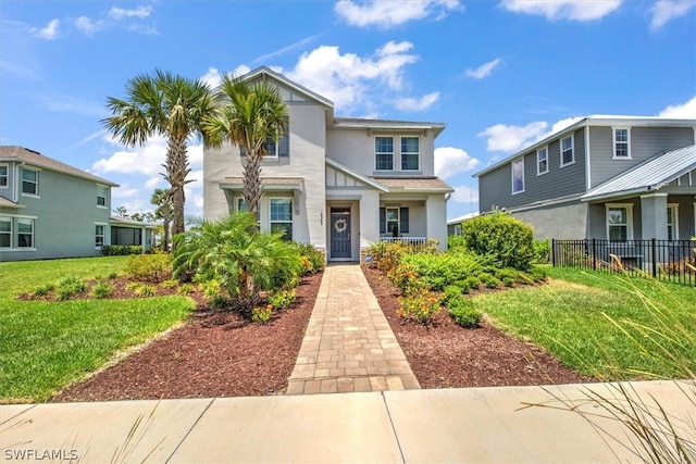 view of front of property featuring a front lawn