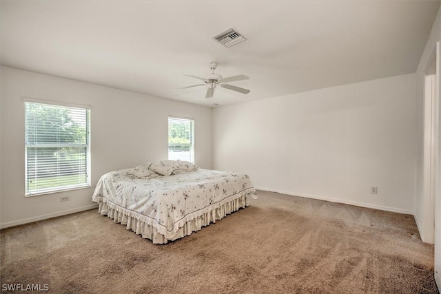 bedroom with carpet flooring and ceiling fan