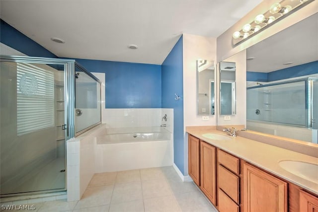 bathroom featuring tile patterned flooring, vanity, and independent shower and bath