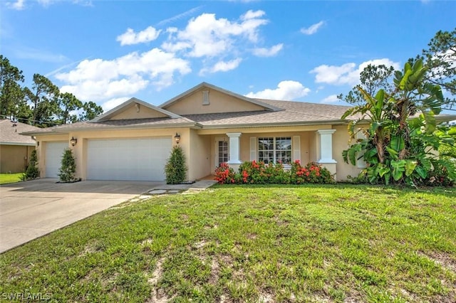 single story home with a garage and a front lawn