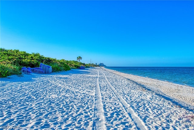 exterior space featuring a beach view