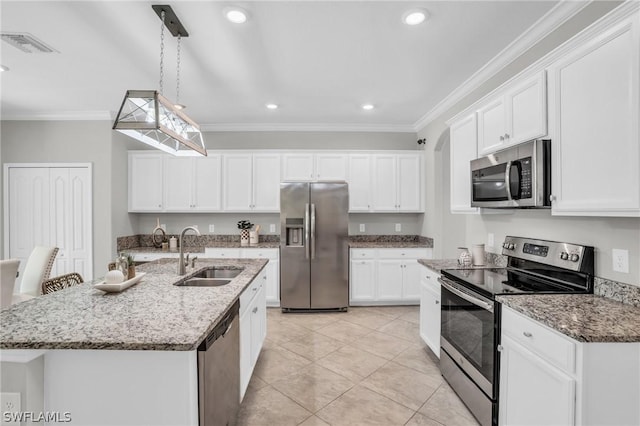 kitchen with crown molding, appliances with stainless steel finishes, white cabinets, and a sink