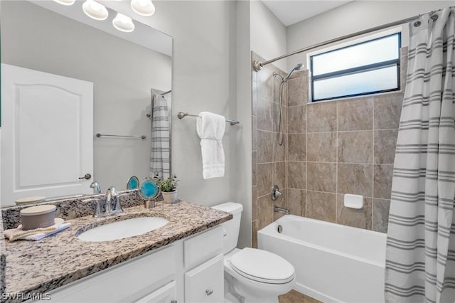 full bath featuring vanity, toilet, and shower / tub combo with curtain