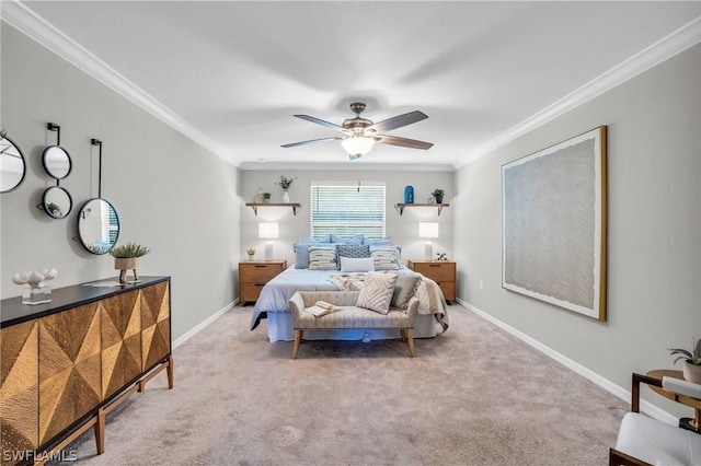 bedroom with ornamental molding, carpet flooring, and baseboards