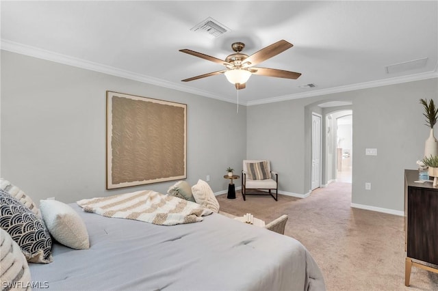 bedroom with arched walkways, baseboards, visible vents, and carpet flooring