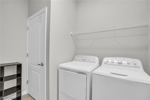 laundry room featuring laundry area and independent washer and dryer