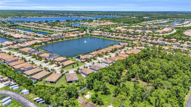 aerial view featuring a water view and a residential view