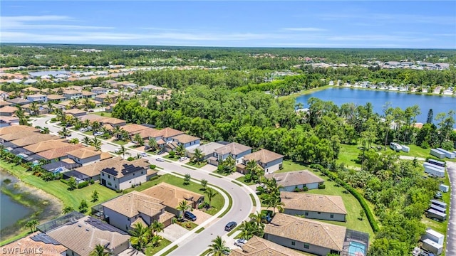 bird's eye view with a water view and a residential view