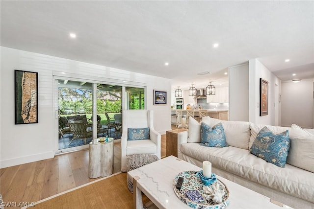 living room with light hardwood / wood-style floors