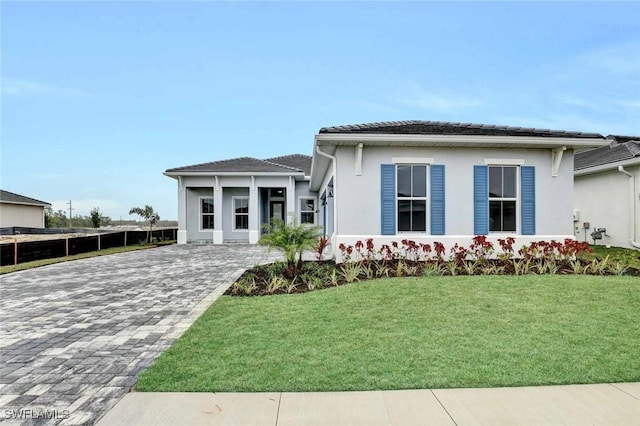 view of front of home with a front lawn