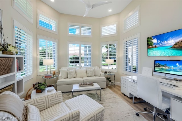 interior space featuring a wealth of natural light and ceiling fan