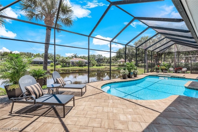 view of swimming pool featuring a patio, a water view, and a lanai