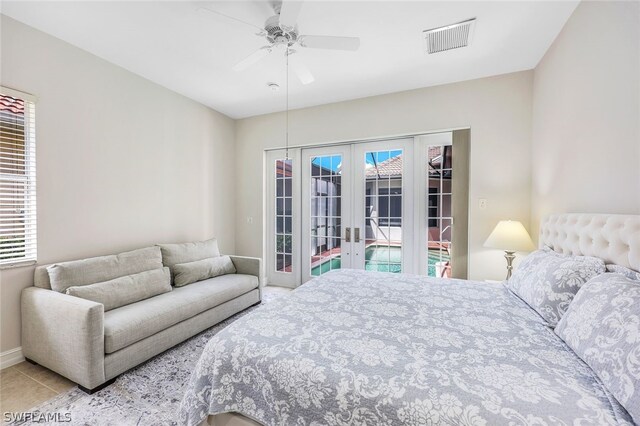 tiled bedroom featuring access to exterior, french doors, and ceiling fan