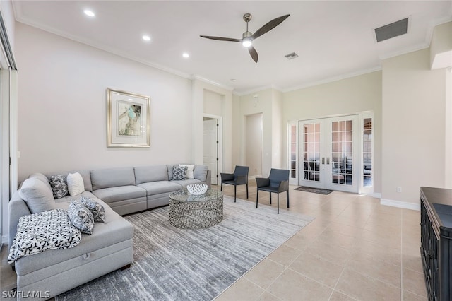 living area with french doors, visible vents, crown molding, and light tile patterned floors