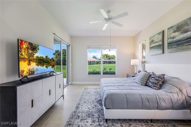 bedroom with access to outside, ceiling fan, and light tile patterned flooring