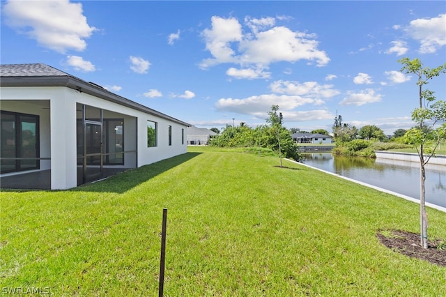 view of yard with a water view