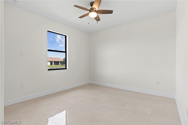 unfurnished room with ceiling fan