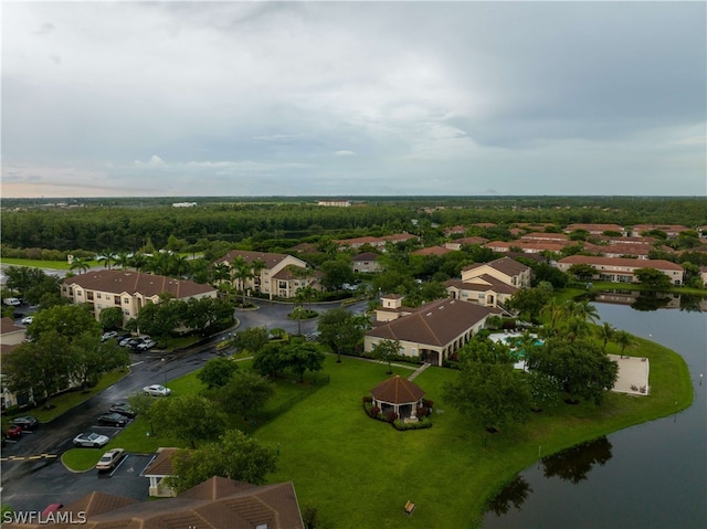 drone / aerial view with a water view